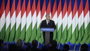 Hungarian Prime Minister Viktor Orban delivers his annual 'State of Hungary' address in Budapest, Hungary, 17 February 2024. The inscription on the podium reads: 'For us Hungary is the first!'. Fot. PAP/EPA/SZILARD KOSZTICSAK