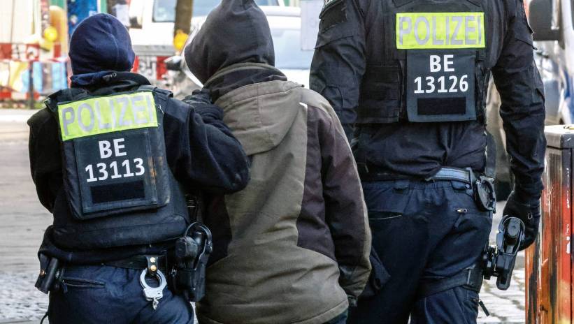 Members of a special police unit escort a person during a search operation for long-sought former members of Germany's Red Army Faction (RAF) militant group, Ernst Volker Staub and Burkhard Garweg, in Berlin, Germany, 03 March 2024. The search comes following the arrest in February 2024 of former RAF member Daniela Klette after more than 30 years on the run. Fot. PAP/EPA/HANNIBAL HANSCHKE