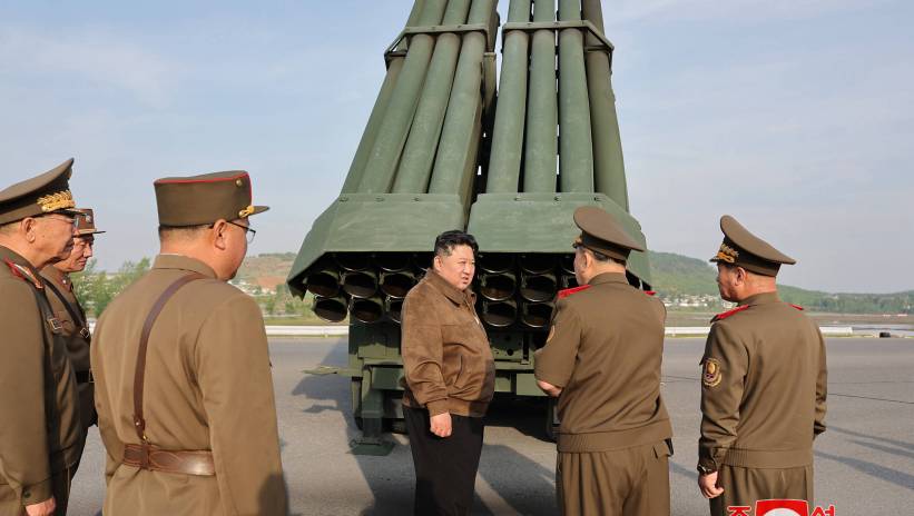 A photo released by the official North Korean Central News Agency (KCNA) shows North Korean leader Kim Jong Un (C) overseeing the test fire of the 240mm multiple rocket launcher system in an undisclosed location in North Korea, 10 May 2024 (issued 11 May 2024). According to KCNA, North Korean leader Kim Jong Un learned about the 240mm multiple rocket launcher system and watched the test-fire of controllable shells for multiple rocket launcher produced at different national defence industrial enterprises on 10 May. Fot. PAP/EPA/KCNA