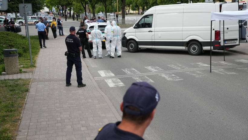 Scientific police investigators work near the cordoned-off crime scene where Slovak Prime Minister Robert Fico was shot earlier in the day, in Handlova, Slovakia, 15 May 2024. According to a statement from the Slovak government office on 15 May, "following a government meeting in Handlova, there was an assassination attempt on the Prime Minister of the Slovak Republic Robert Fico. He is currently being transported by helicopter to Banska Bystrica Hospital in a life-threatening condition." Fot. PAP/EPA/JAKUB GAVLAK