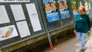 Legislative election posters on billboards, including French member of parliament and previous candidate for French presidential election Marine Le Pen (C-L) and Leader of the French extreme right party Rassemblement National (RN, National Front) Jordan Bardella (C-R), outside of polling station in Malakoff, near Paris, France, 29 June 2024. The upcoming snap legislative election in France takes place on 30 June and 07 July. Fot. PAP/EPA/Mohammed Badra