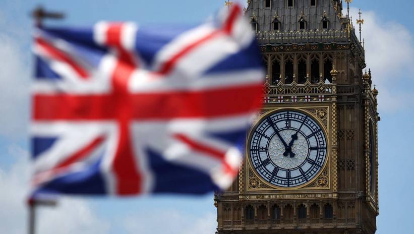 The British Union flag flutters in front of the Parliament building on General Election day, in London, Britain, 04 July 2024. Britons are heading to the polls to elect new members of Parliament following the call by Britain's Prime Minister Sunak for a snap election. Fot. PAP/EPA/ANDY RAIN