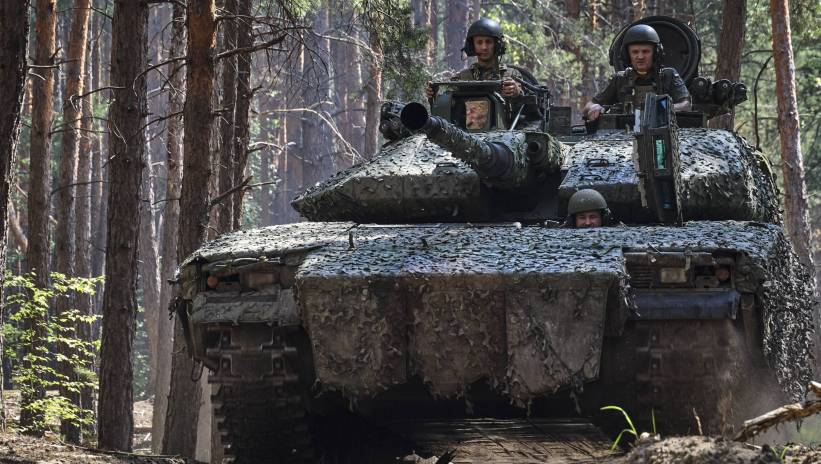 Ukrainian servicemen of the 57th Motorized Brigade attend their rest and regroup at an undisclosed location in the Kharkiv area, Ukraine, 18 June 2024, amid the Russian invasion. The combat units of the 57th Motorized Brigade, waging continuous battles in the Vovchansk direction in Kharkiv's region, are replenishing personnel, combat coordination, maintenance, and equipment preparation for returning to the front line. Russian troops entered Ukrainian territory on 24 February 2022, starting a conflict that has provoked destruction and a humanitarian crisis. Fot. PAP/EPA/SERGEY KOZLOV