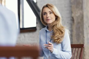 close-up-woman-sitting-chair (1)