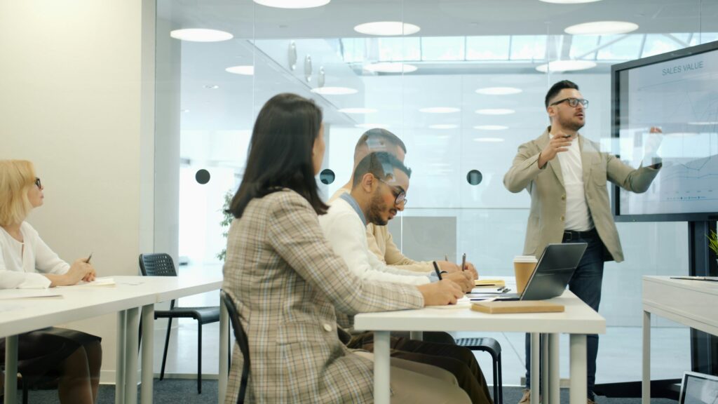 meeting-mature-office-showing-presenter